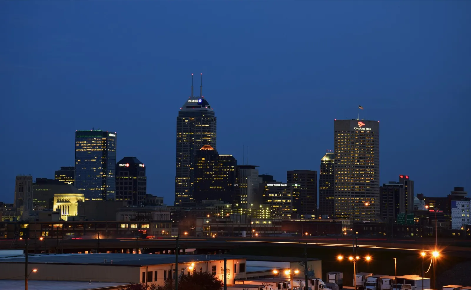 The downtown Indianapolis skyline at night, including Chase Tower and the OneAmerica Building
